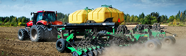 Photo of tractor with spraying attachment