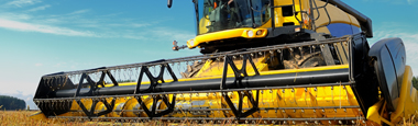 Photo of header on combine in field